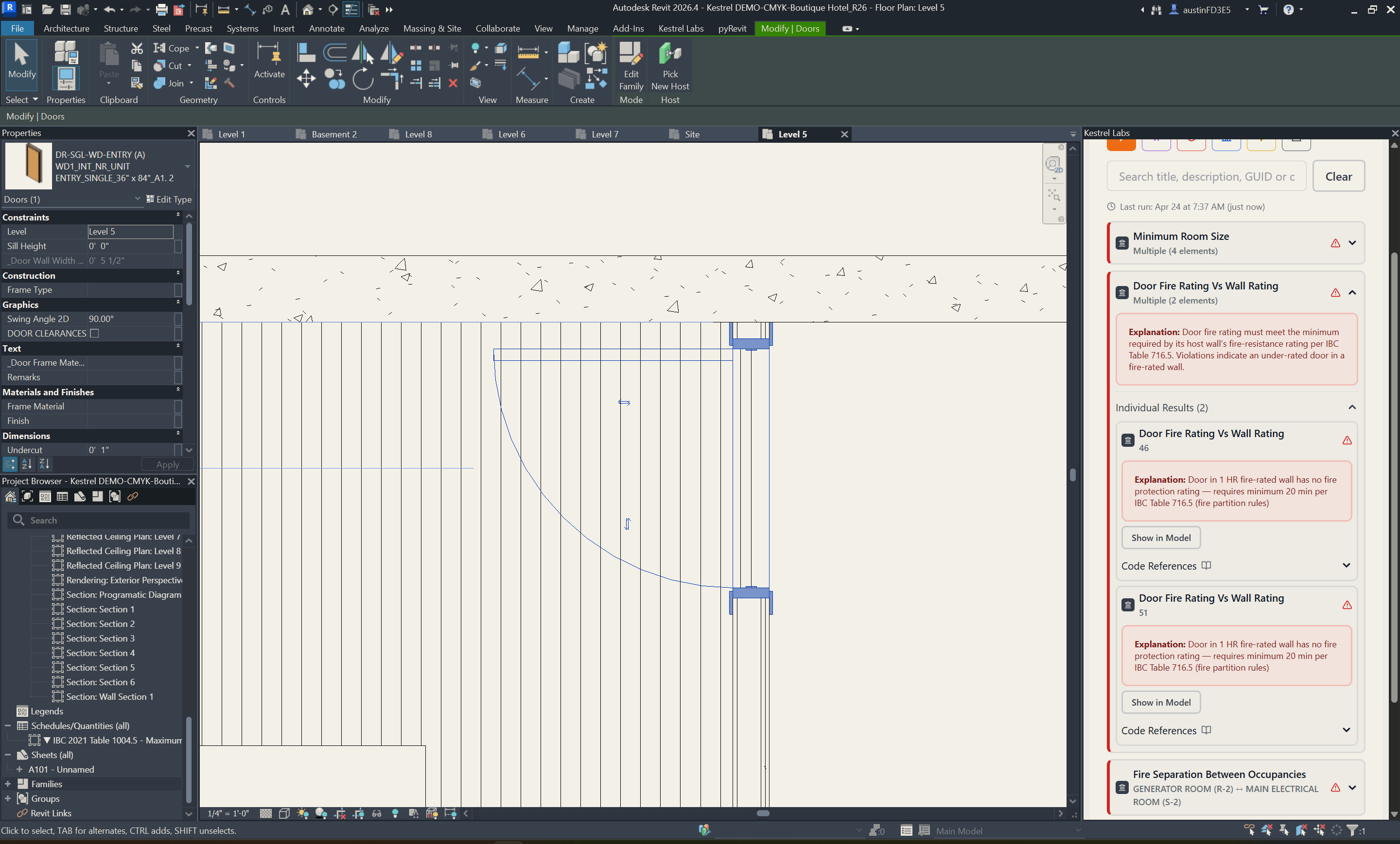 Kestrel Compliance Analysis open inside Revit on a floor plan, with the side panel expanded on an IBC 2021 Table 716.1(2) door fire rating violation.